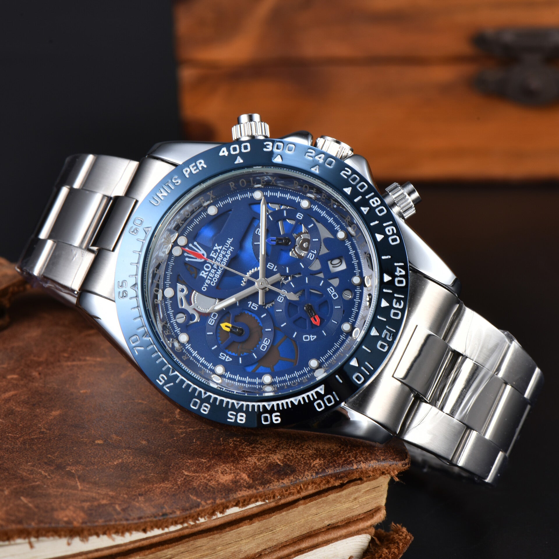 silver-toned Rolex Daytona La Montayo with a blue skeleton dial and a steel band