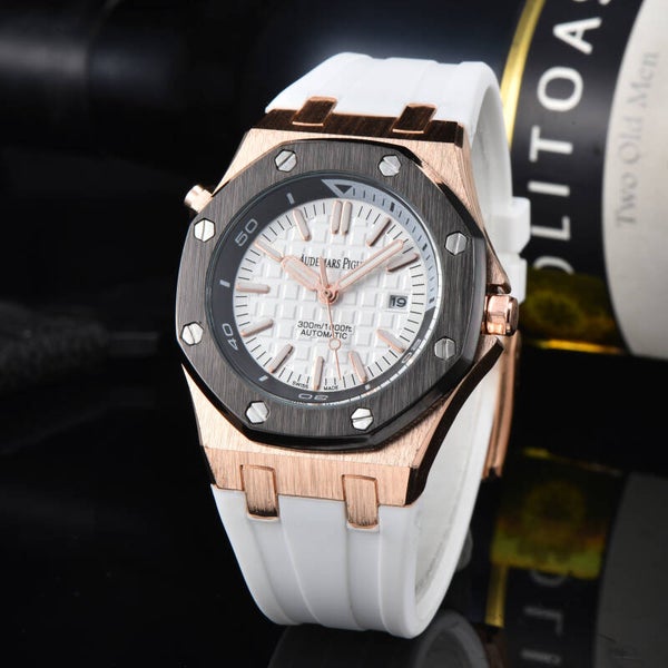 Audemars Piguet Royal Oak Offshore Diver with a rose gold and titanium case, slate grey dial, and white rubber strap