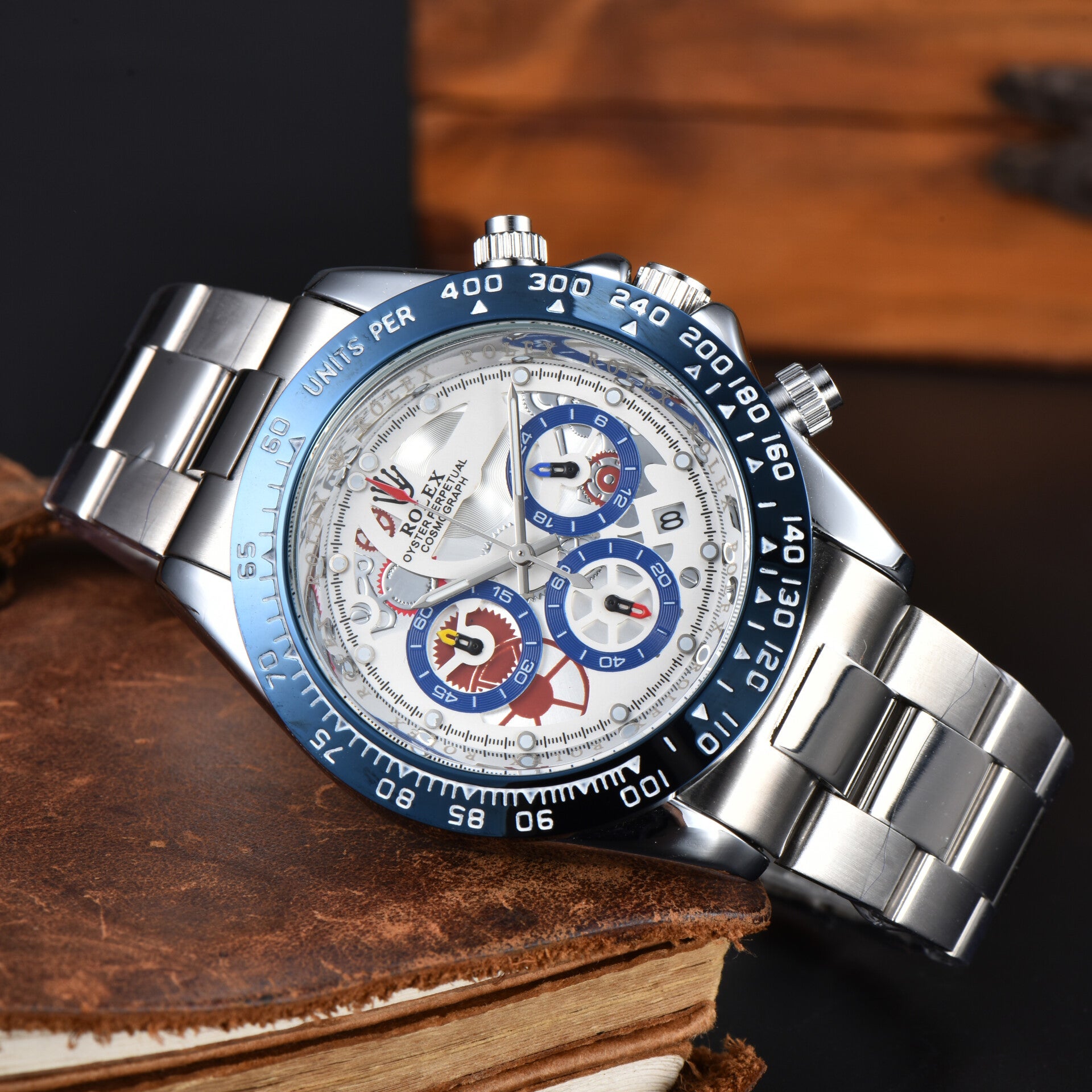 Rolex Cosmograph Daytona with a white dial and a blue tachymetric scale bezel
