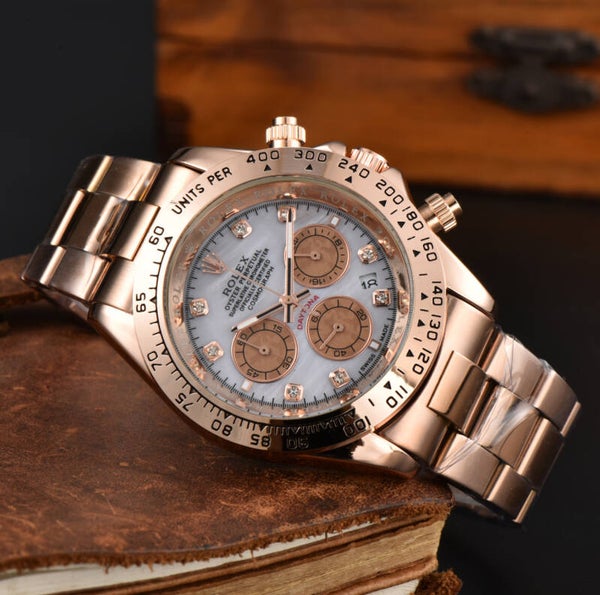 Rose gold tone Rolex Cosmograph Daytona watch featuring a mother-of-pearl dial with diamond hour markers