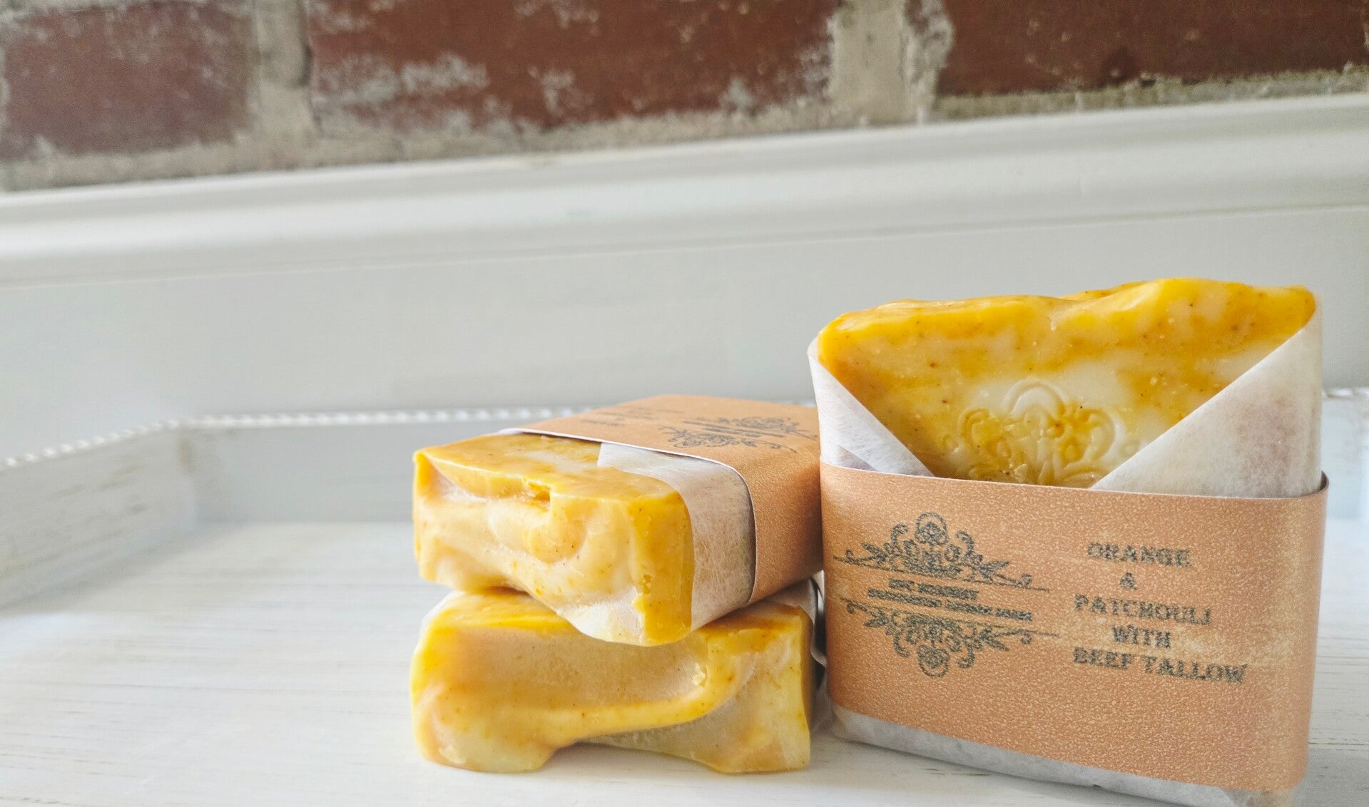 Orange and Patchouli with beef tallow