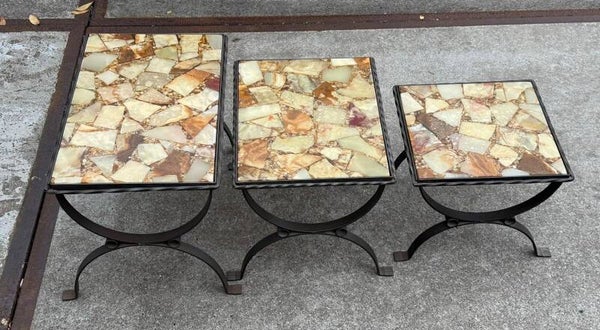 a set of three vintage nesting tables, likely from the 1970s