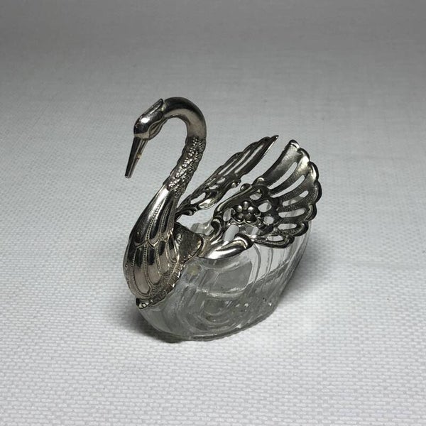 Kristallen zwaantje met verzilverde metaal