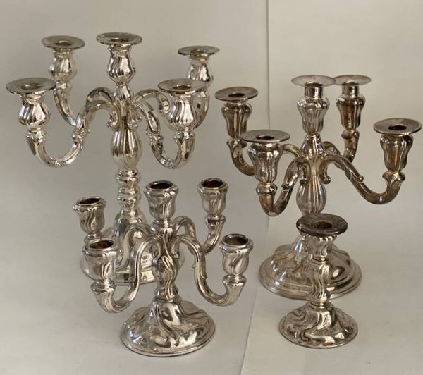 Vier verzilverde kandelaars