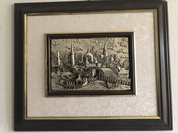 Verzilverde ingelijste muurdecoratie