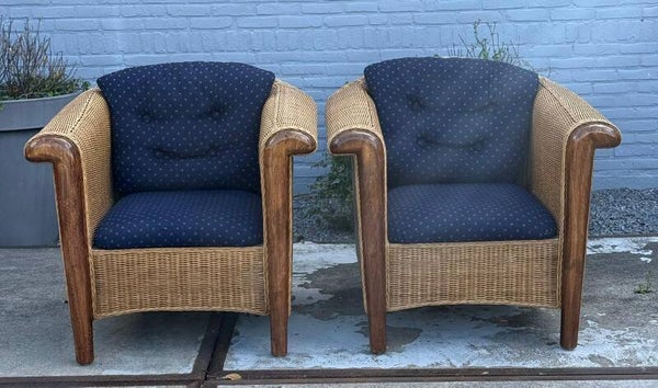 Pair of round wicker armchairs