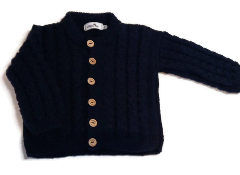 Merinos wollen vestje met kabel patroon, maat 86