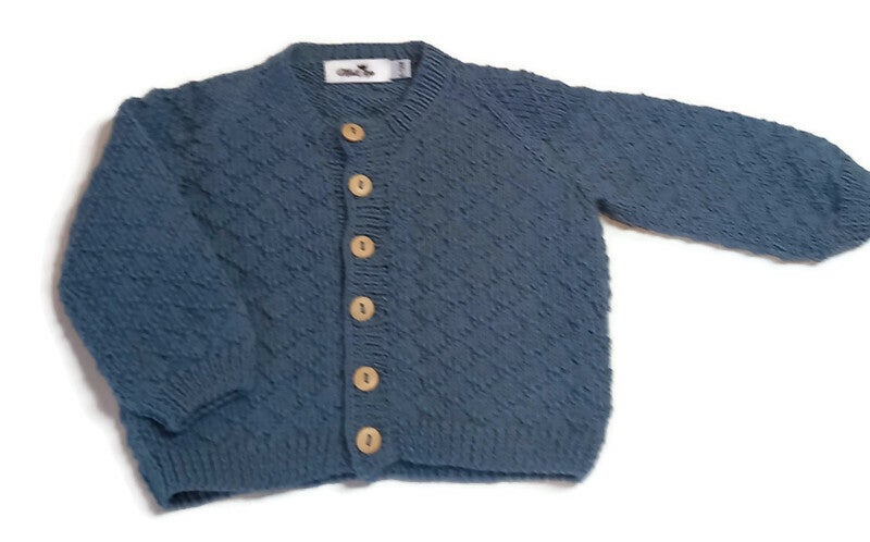 Merinos wollen vestje, jeansblauw met ruit patroon. Maat 6/12 mnd.