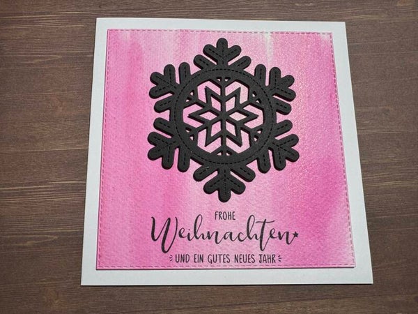Weihnachten: grosser Schneestern schwarz auf pink