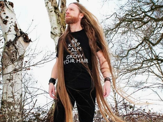 0,000000001 m/s  - de gemiddelde groeisnelheid van menselijk haar