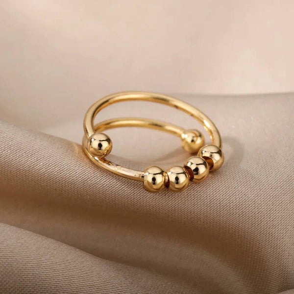 Anti-Stress-Ring in Gold – Mit drehbaren Perlen