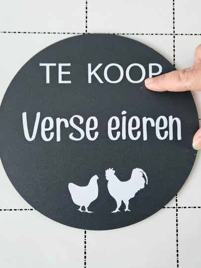 Kleine beschadiging "Verse eieren bord"