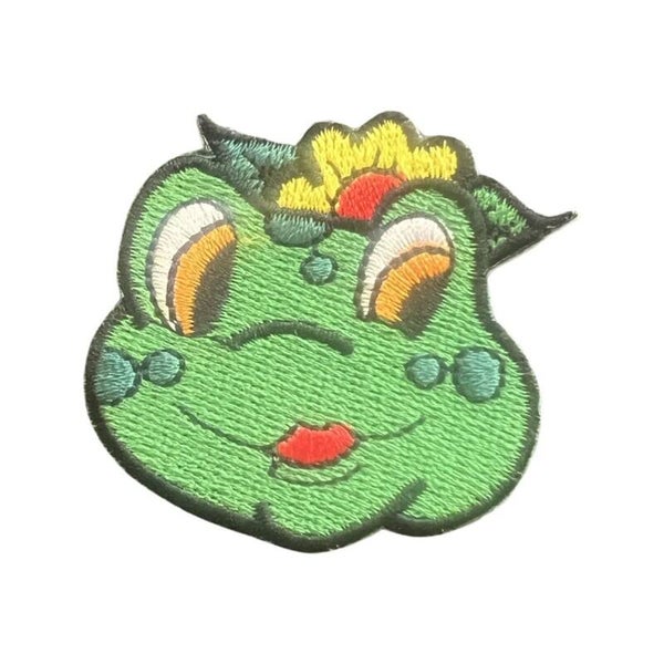 Kikkerkop met gele bloem.DB104