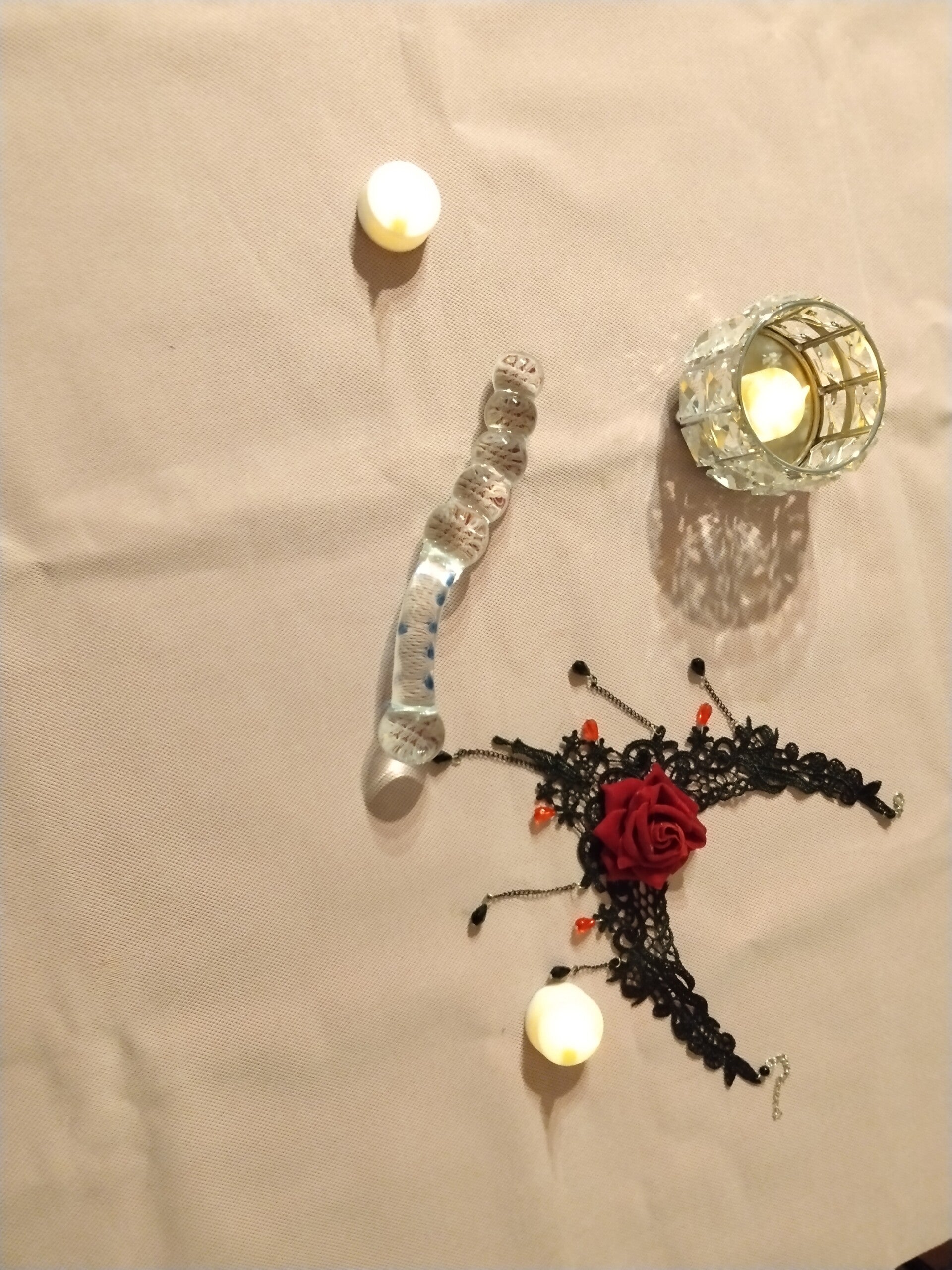 Gode en verre perles