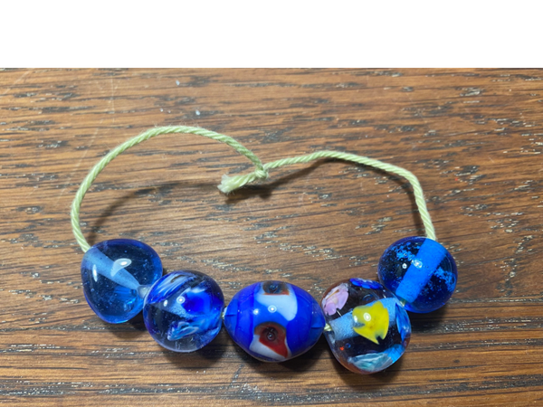 Glaskralen donker blauw helder set