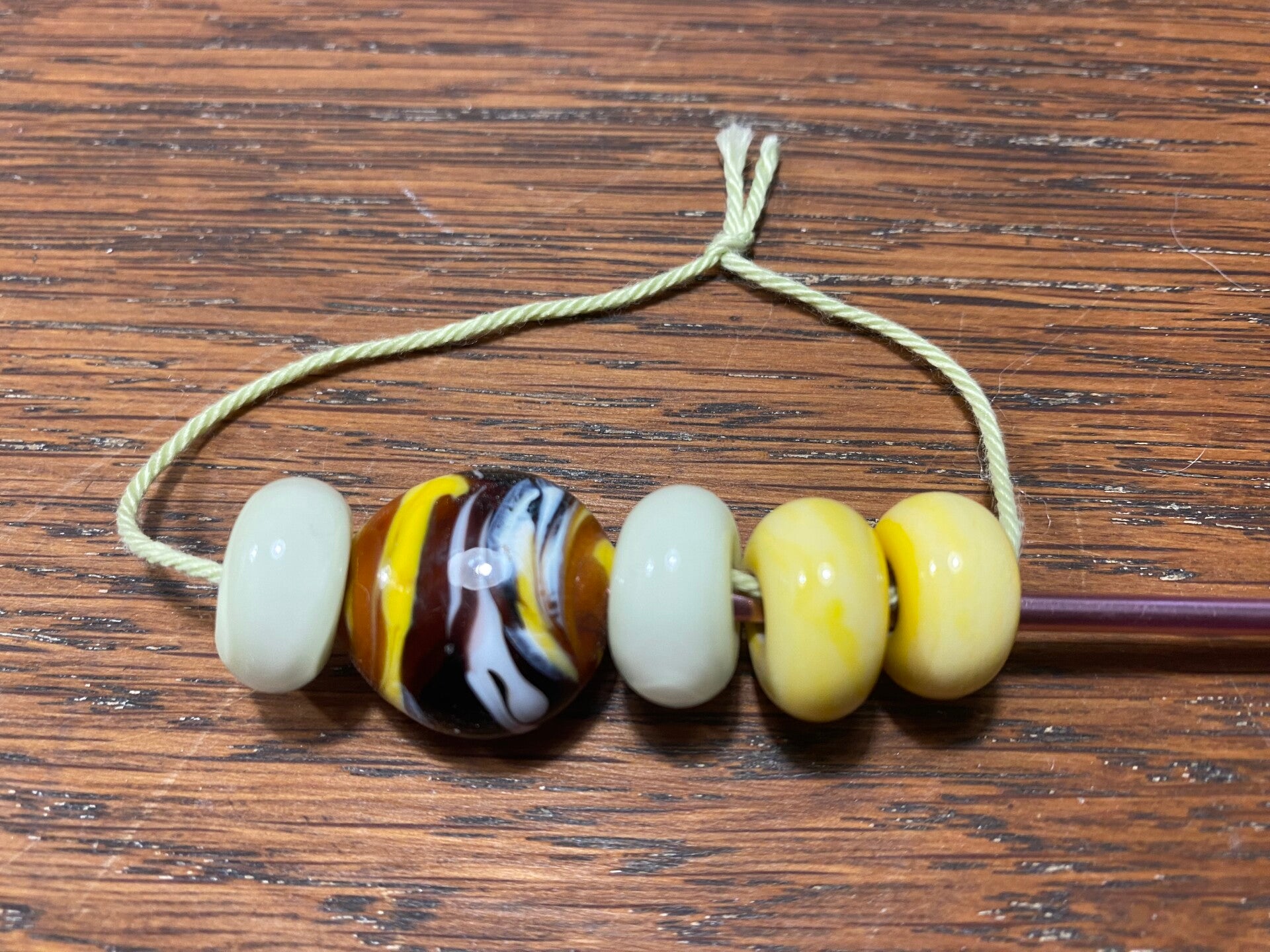 Glaskralen geel / bruin set