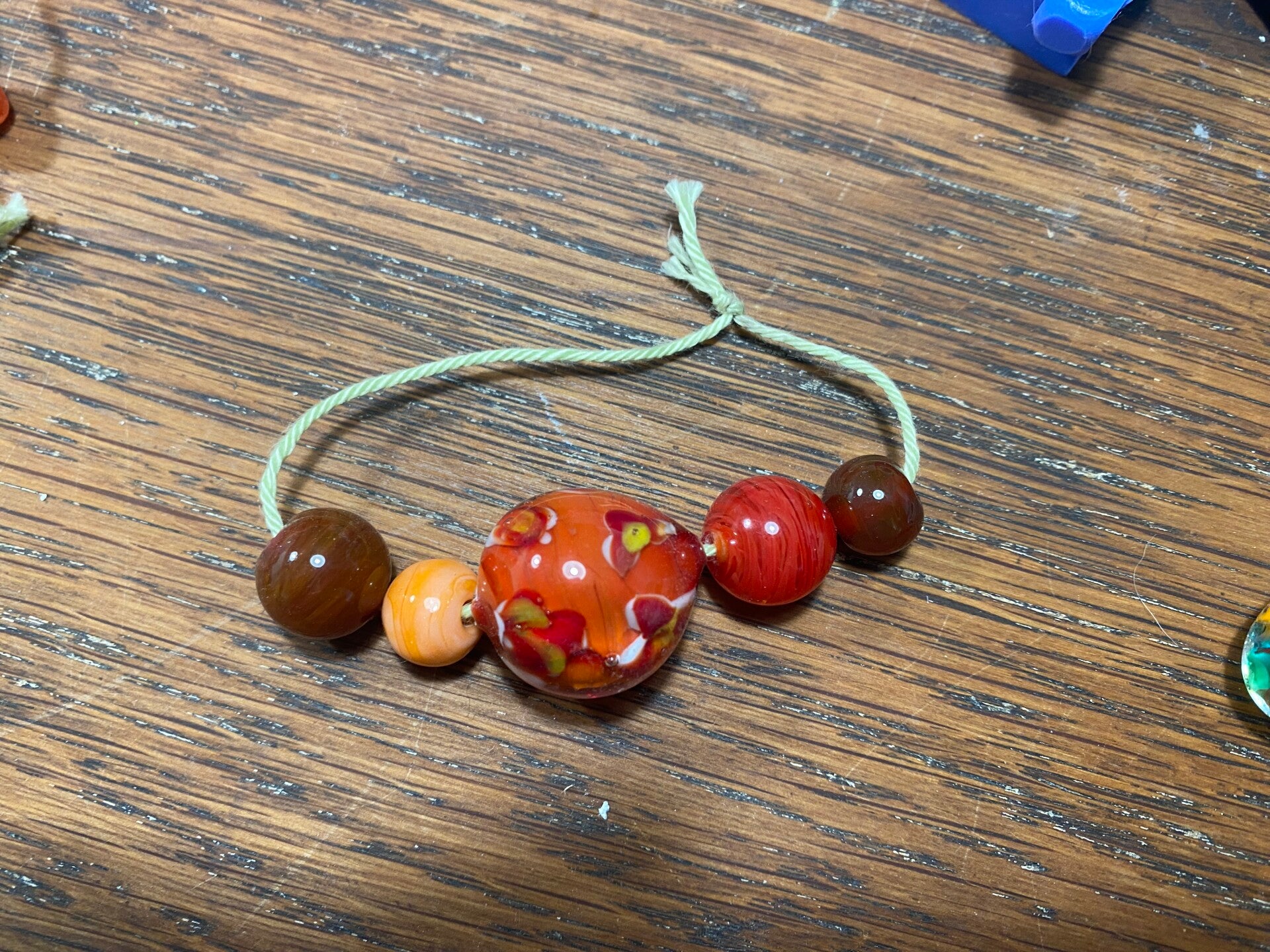 Glaskralen bordeux / oranje / bruin set