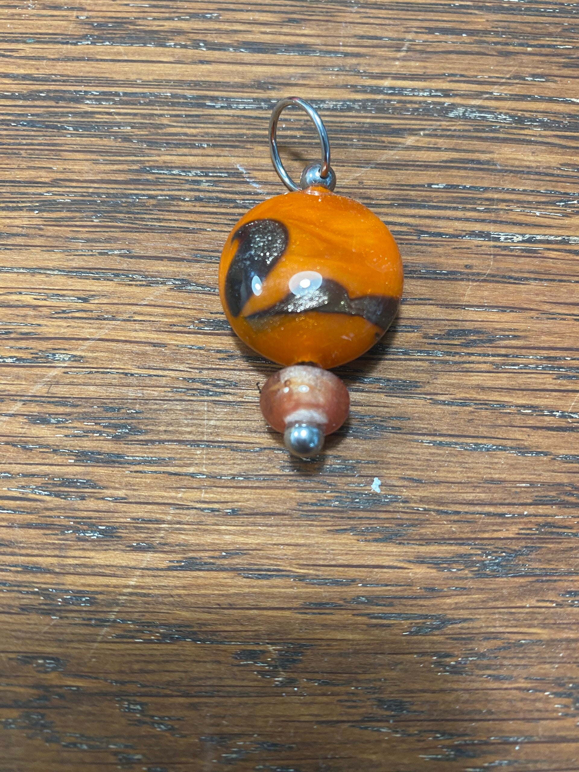 Glaskralen oranje met hanger