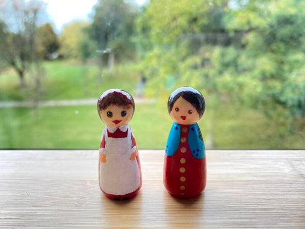 Kok of vrouw met mantel