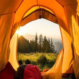 view-out-of-orange-tent-5c169fe346e0fb000166cdab-standard.jpg