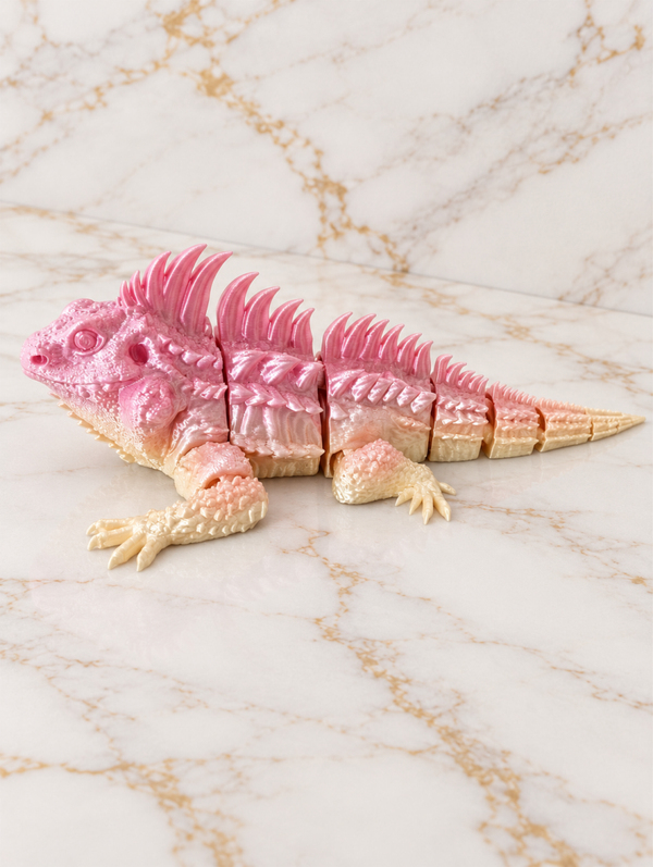 Beweegbare leguaan – roze & geel – 15,5 cm