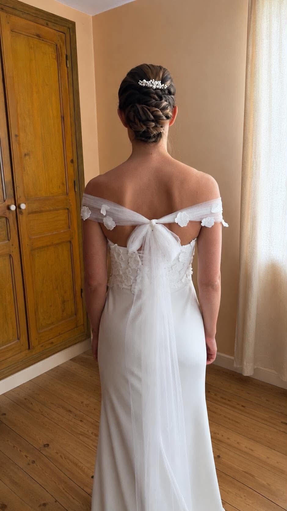photo d'une coiffure effectuée par la coiffeuse de Rignac Univers du Cheveu pour le salon du mariage d'Olemps