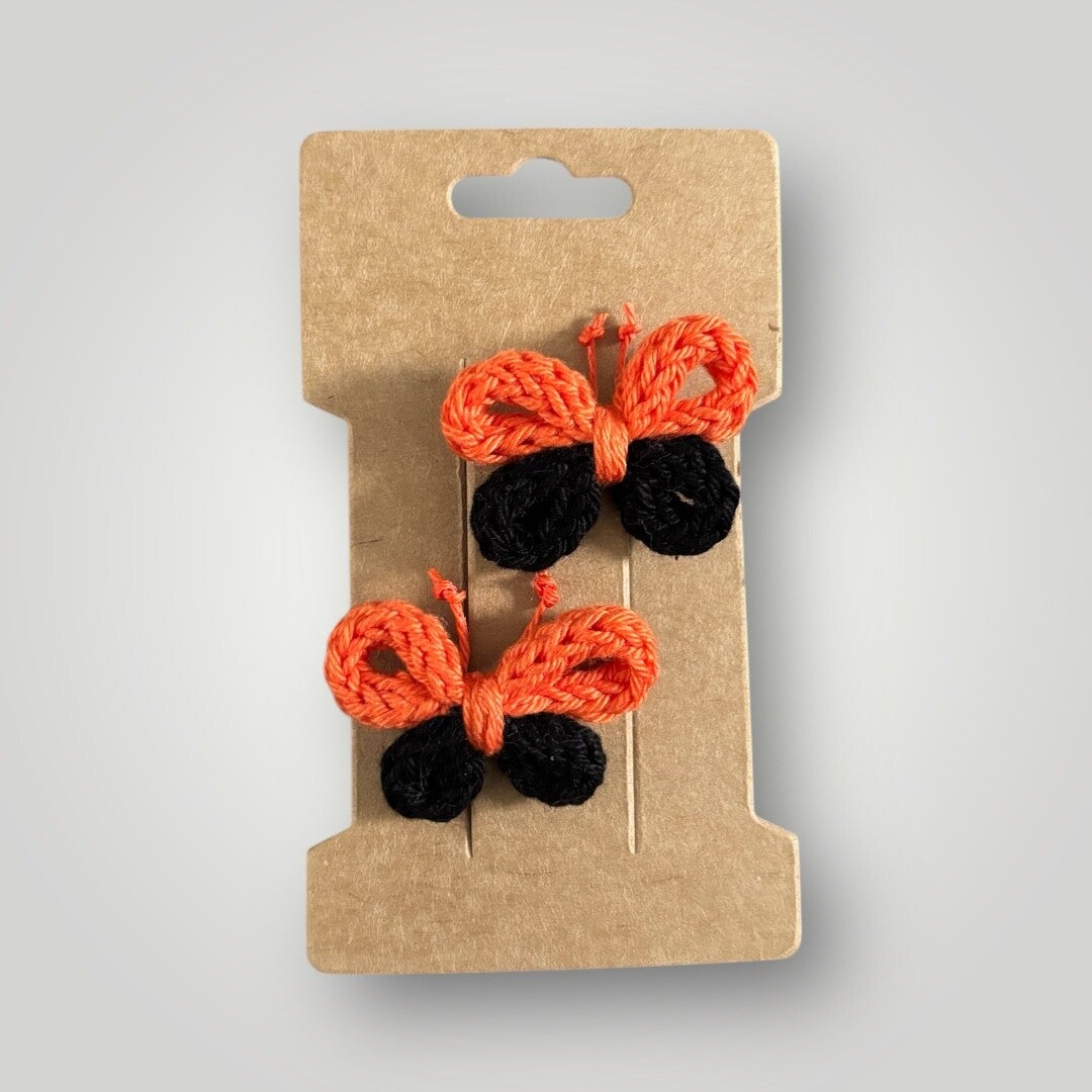 Oranje zwarte vlinder haarclipjes