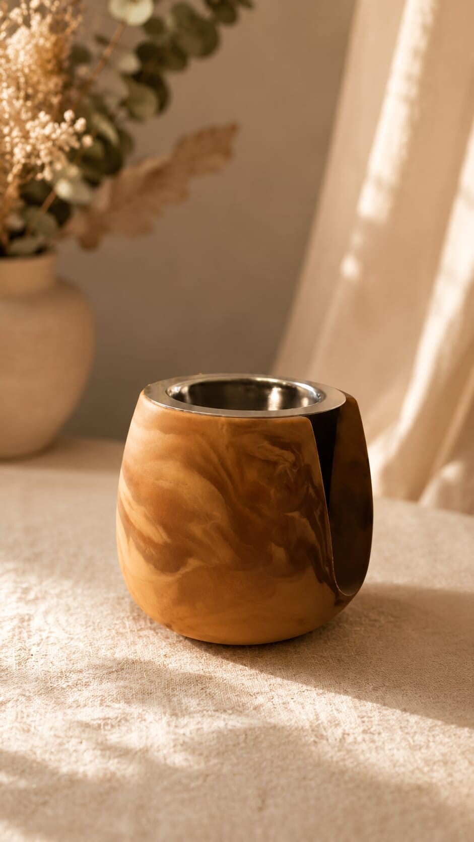 Quemador pequeño con wax melts y vela de té