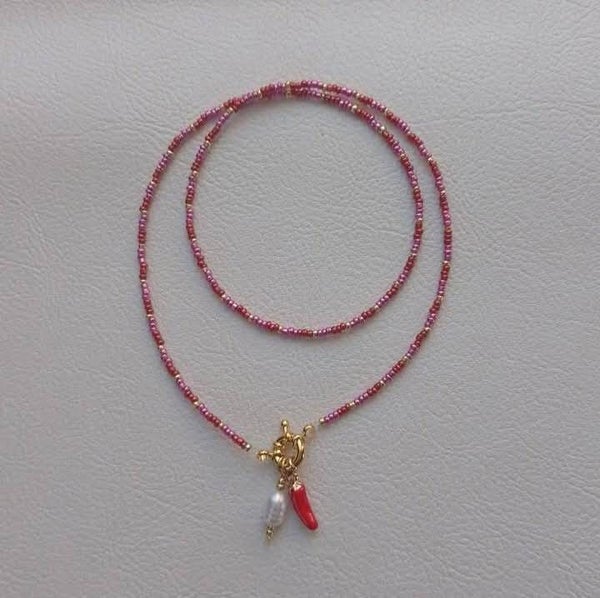 Rvs kralen peper/zoetwaterparel ketting