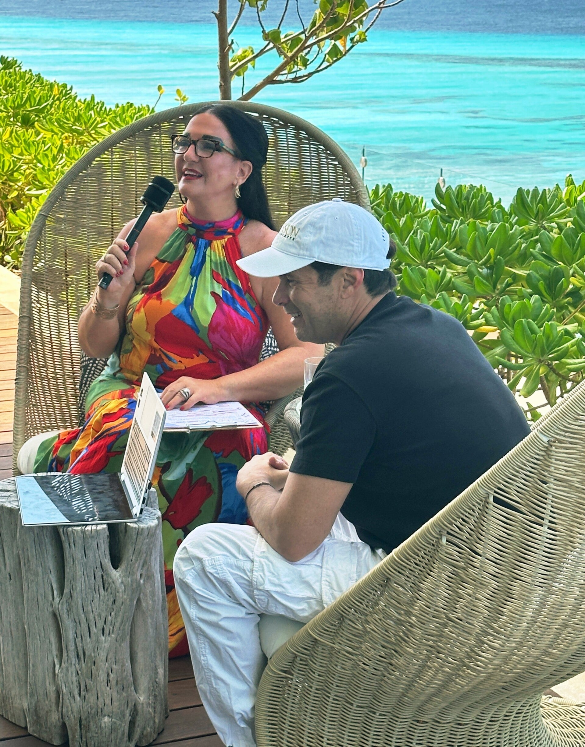 Accredited travel writer Terri Guthrie interviewing owner Jorge Macari at the ultra-luxury Impression Isla Mujeres by Secrets resort in Cancun, Mexico.