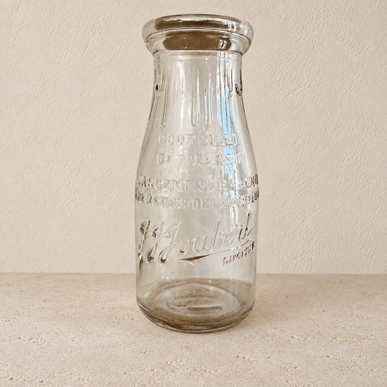 Bouteille de lait ancienne – Un témoin du quotidien d’autrefois
