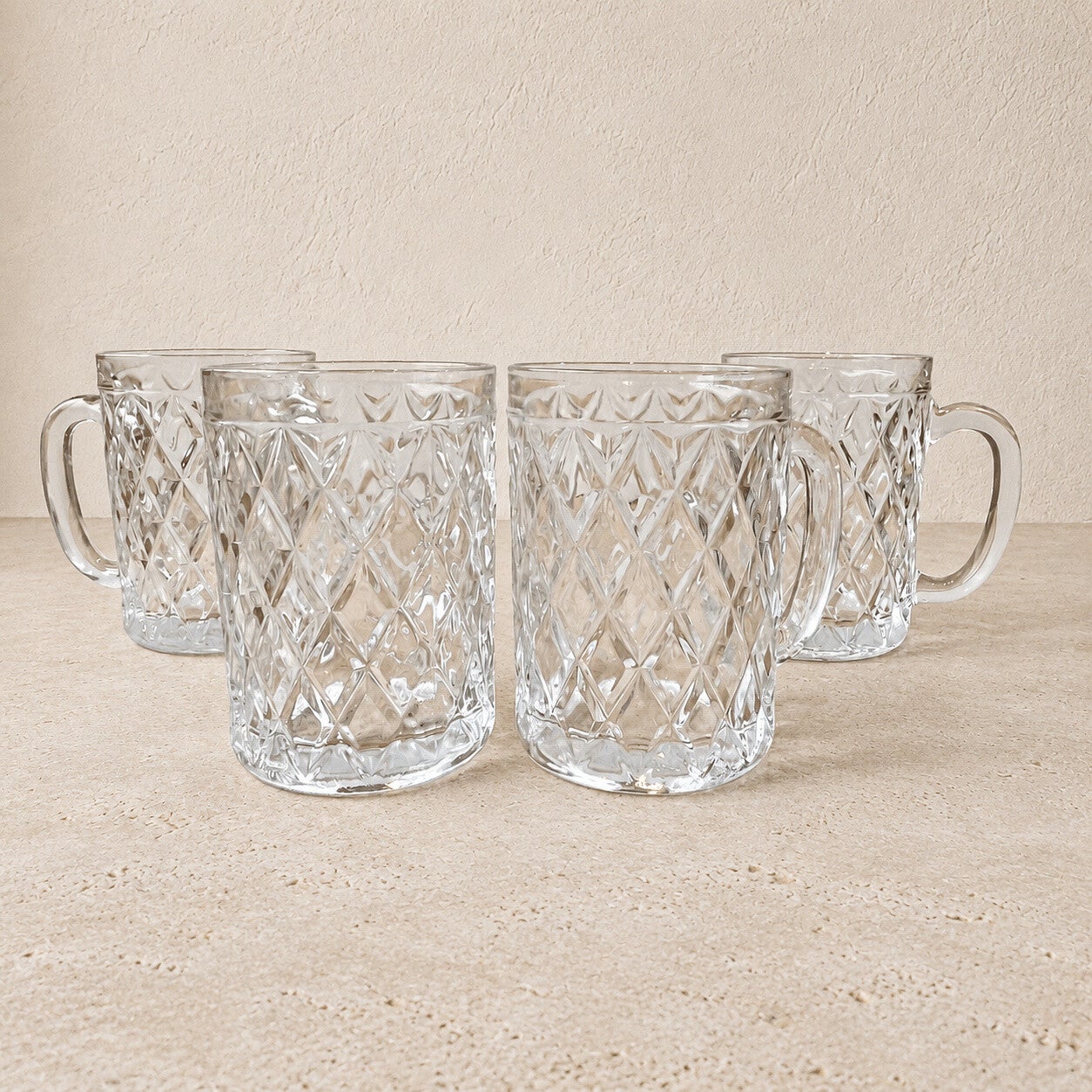 Ensemble de 4 chopes en verre ciselé – verrerie vintage pour table