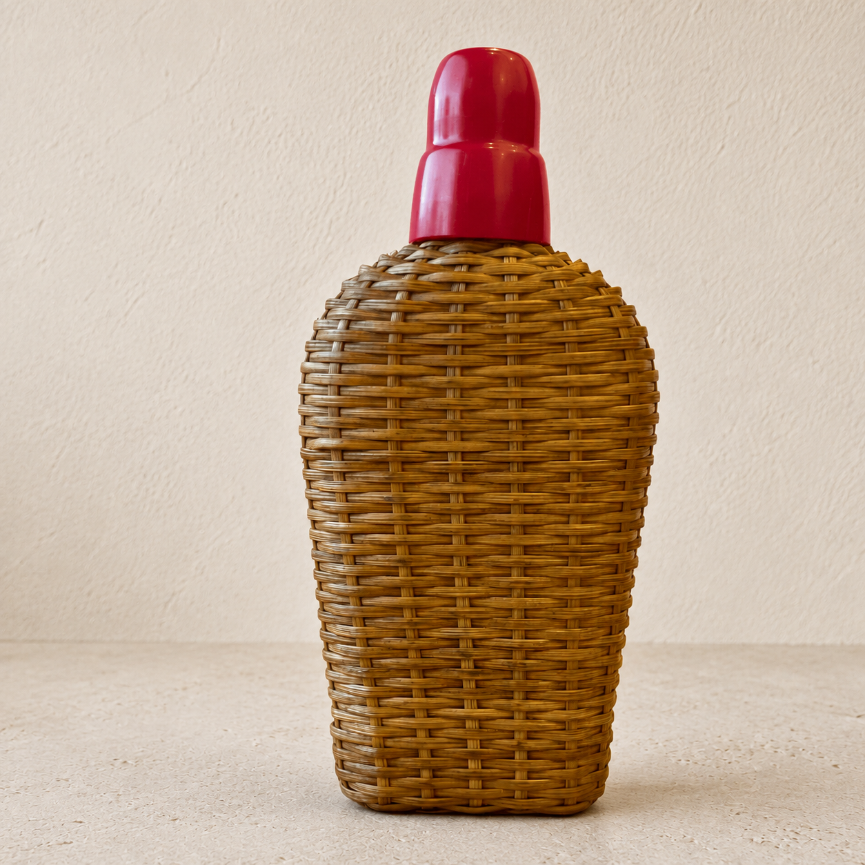 Ancienne gourde en verre et osier tressé