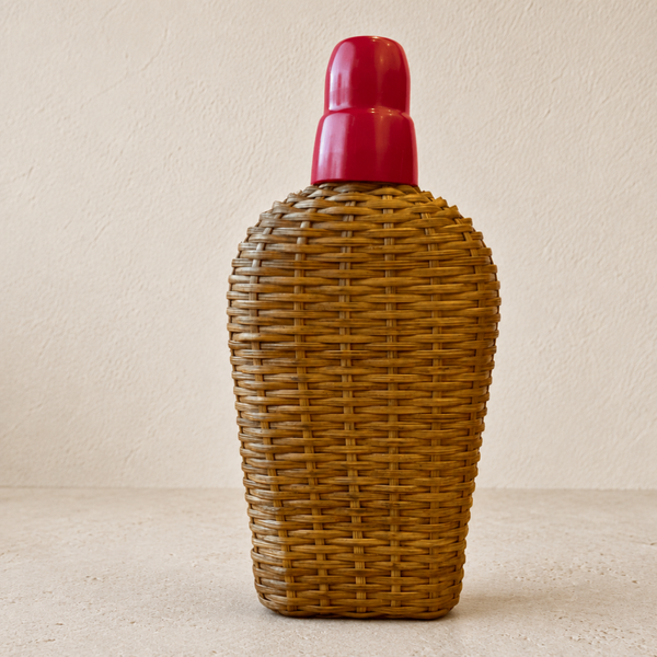 Ancienne gourde en verre et osier tressé