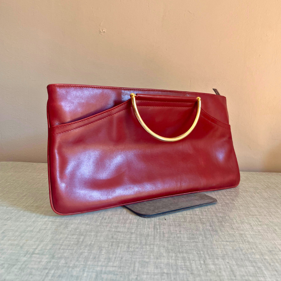 Sac à main bordeaux à poignées dorées transformable en pochette – Élégance et raffinement intemporel