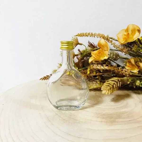 Portoflesje met gouden dop per 12 stuks