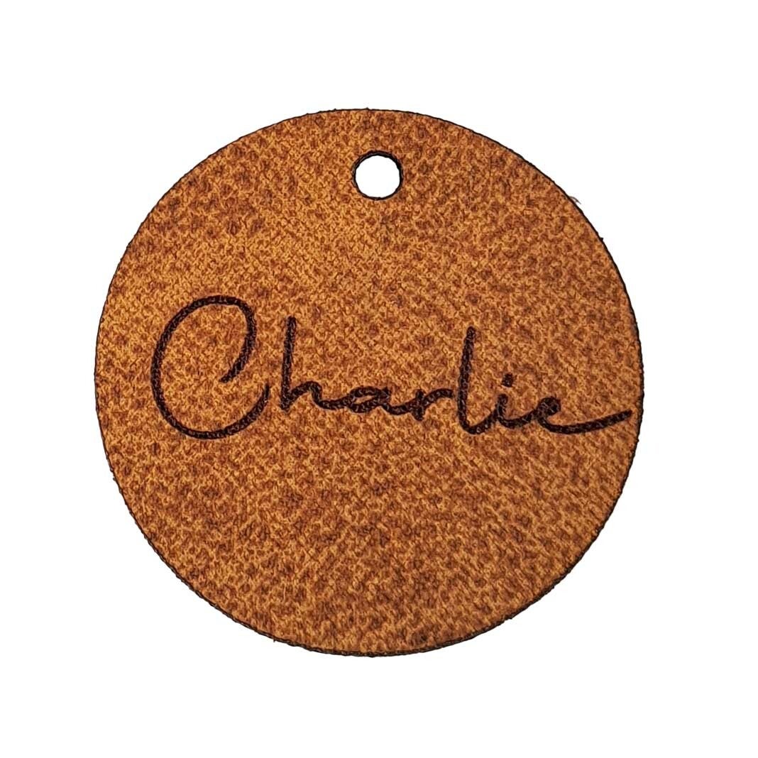 Rond label in Mississippi Leder met gravure - 20st