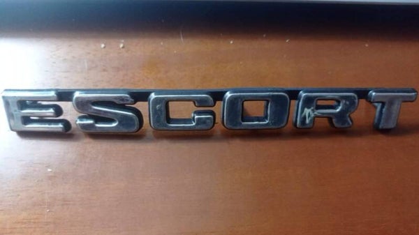 FREGIO STEMMA SCRITTA IN PLASTICA (FORD) ESCORT