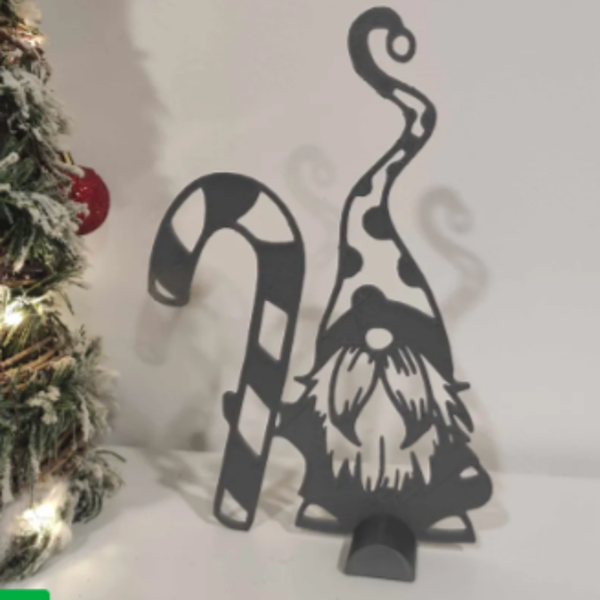 Gnome avec canne à sucre