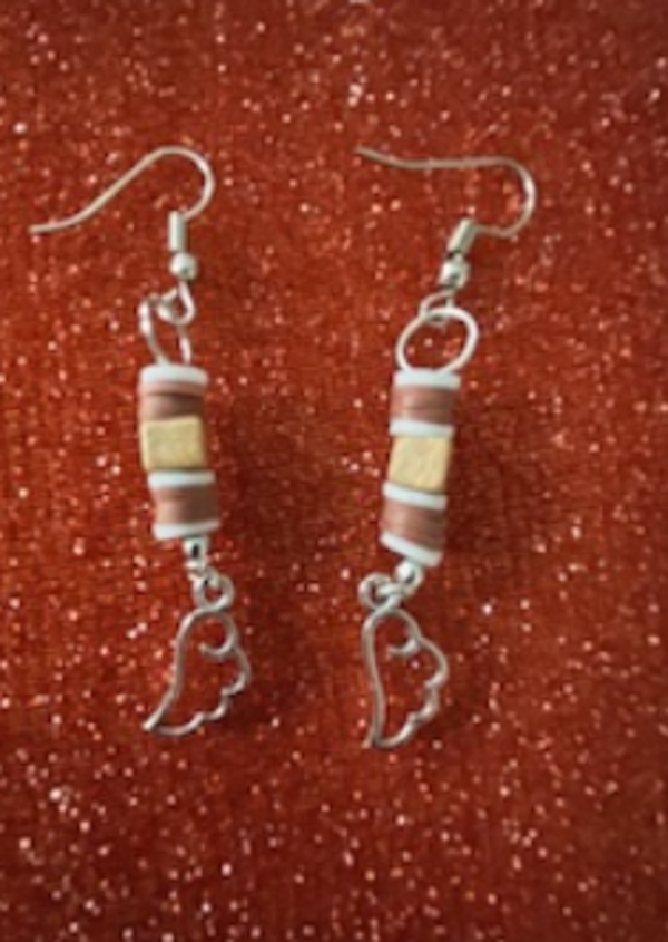 boucles d'oreilles - oreilles  percées