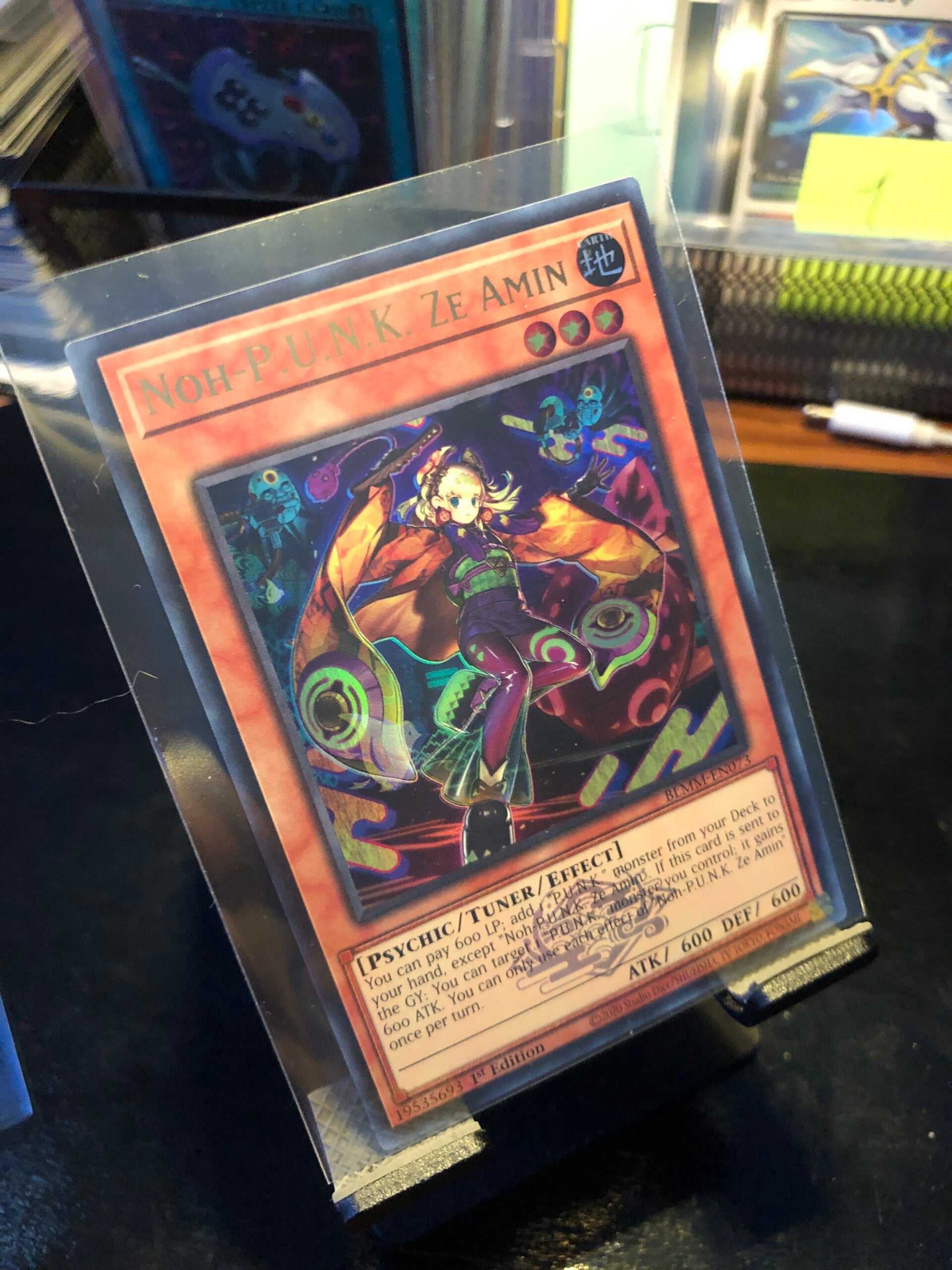 Yu-Gi-Oh! - Battles Of Legend: Monster Mayhem - Noh-P.U.N.K. Ze Amin (Crest) - Ultra Rare - BLMM-EN073 - Monster/Tuner/Effect Card