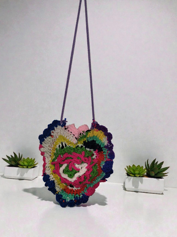 Freeform motif crochet bag lined with pocket