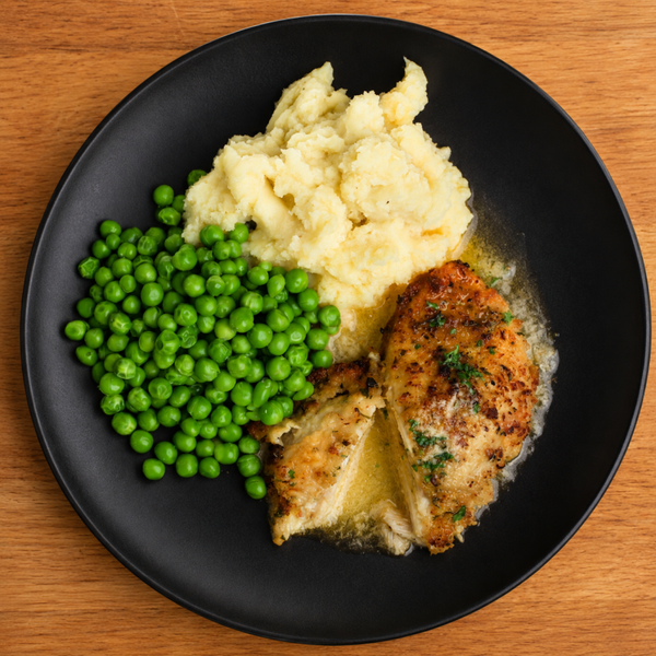 Garlic & herb chicken Kiev mash & peas
