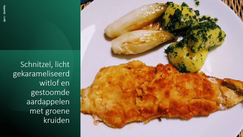 Schnitzel, licht gekarameliseerd witlof en gestoomde aardappelen met groene kruiden