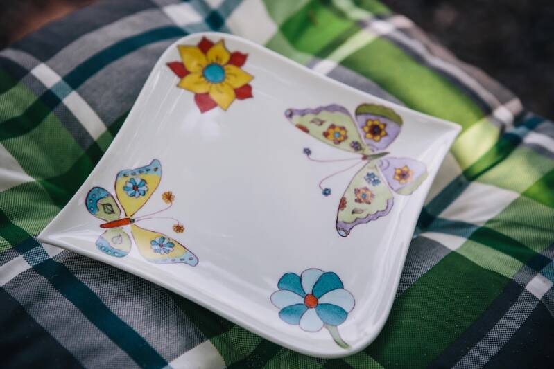 bord vlinders en bloemen