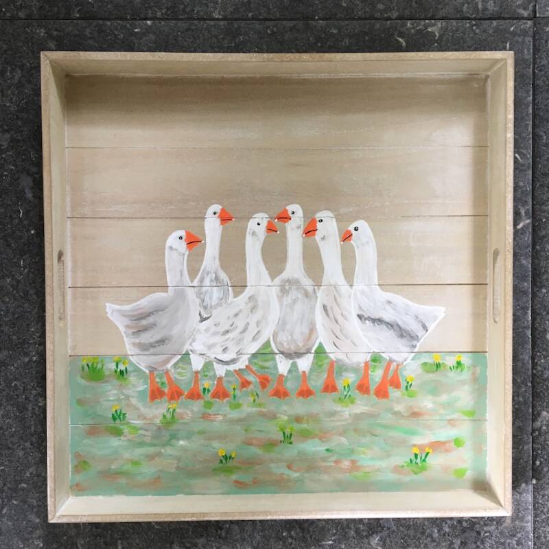 ganzen naast elkaar op dienblad