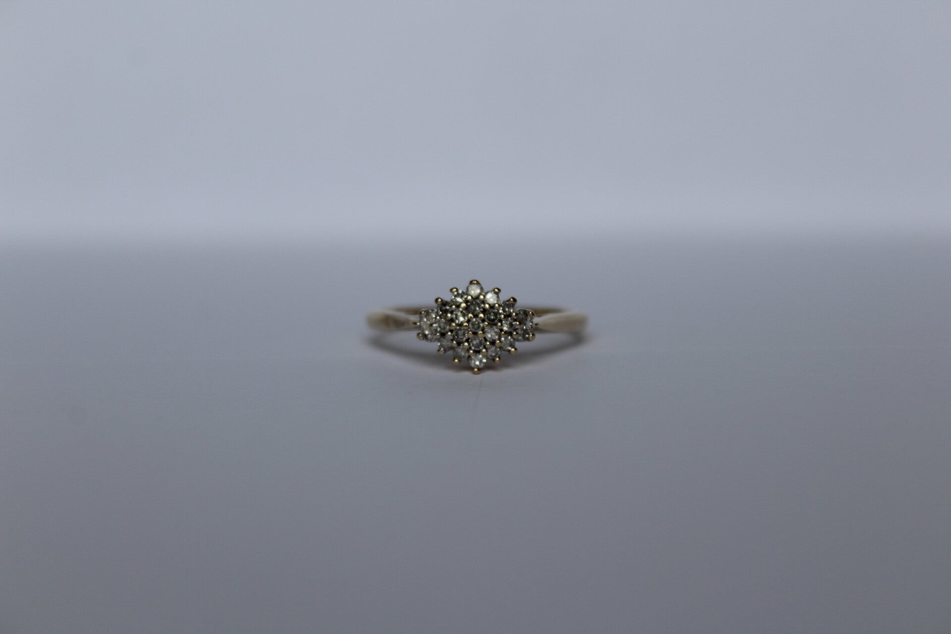 Demi- diamond cluster ring