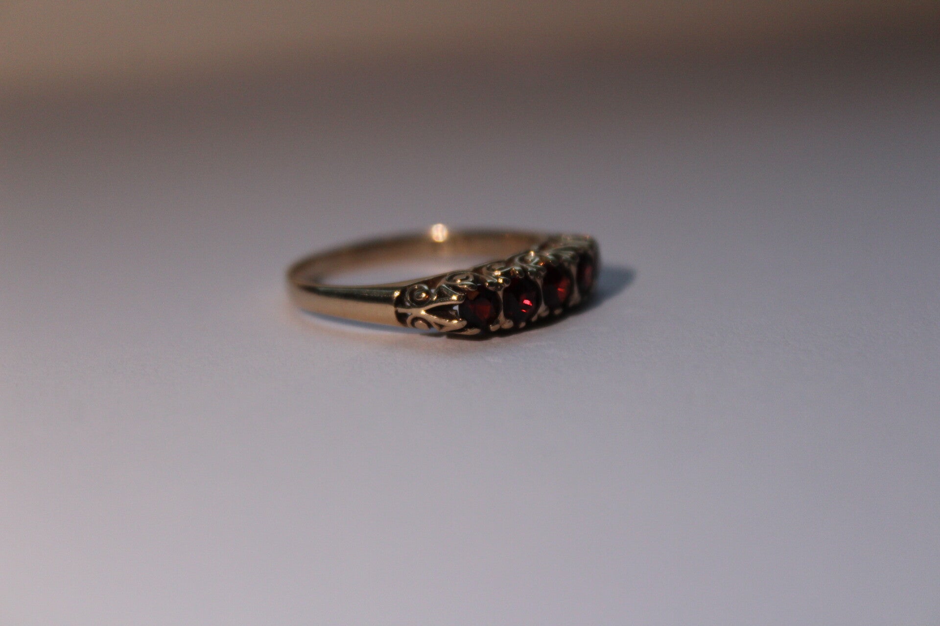 Djenna - 5 stone garnet rowring
