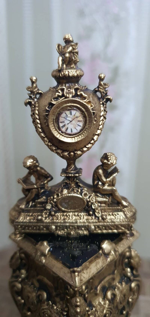 Metalen Pendule met Putti (1:12