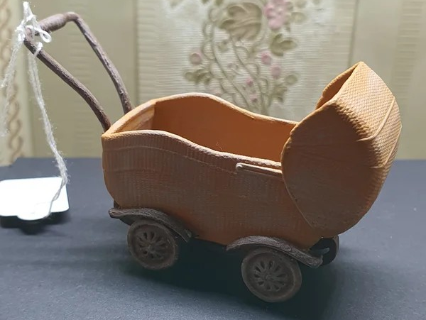 Antieke kinderwagen